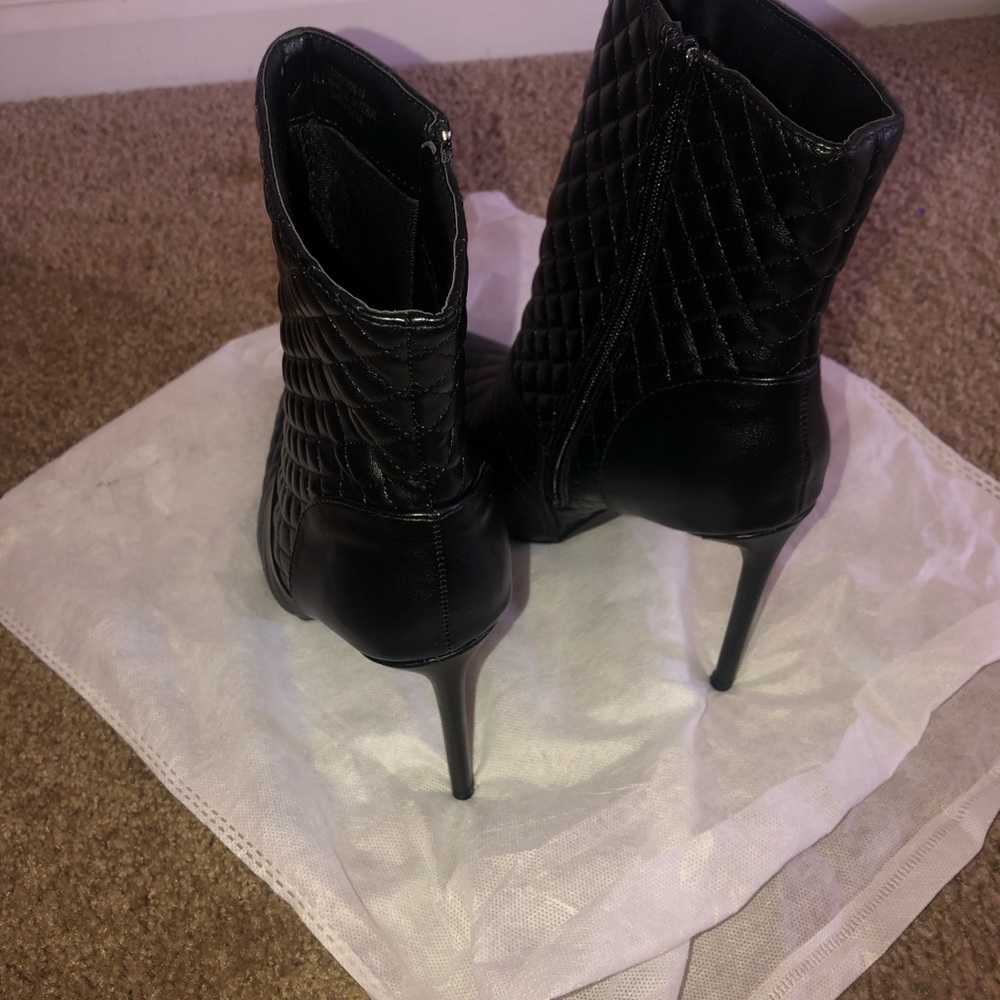 Black leather Women Stilleto boot size 10 ….This is one sexy Botox New…
